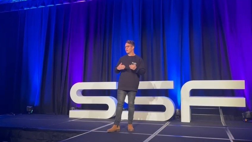 Yoni Kozminski speaking on the Sell and Scale stage